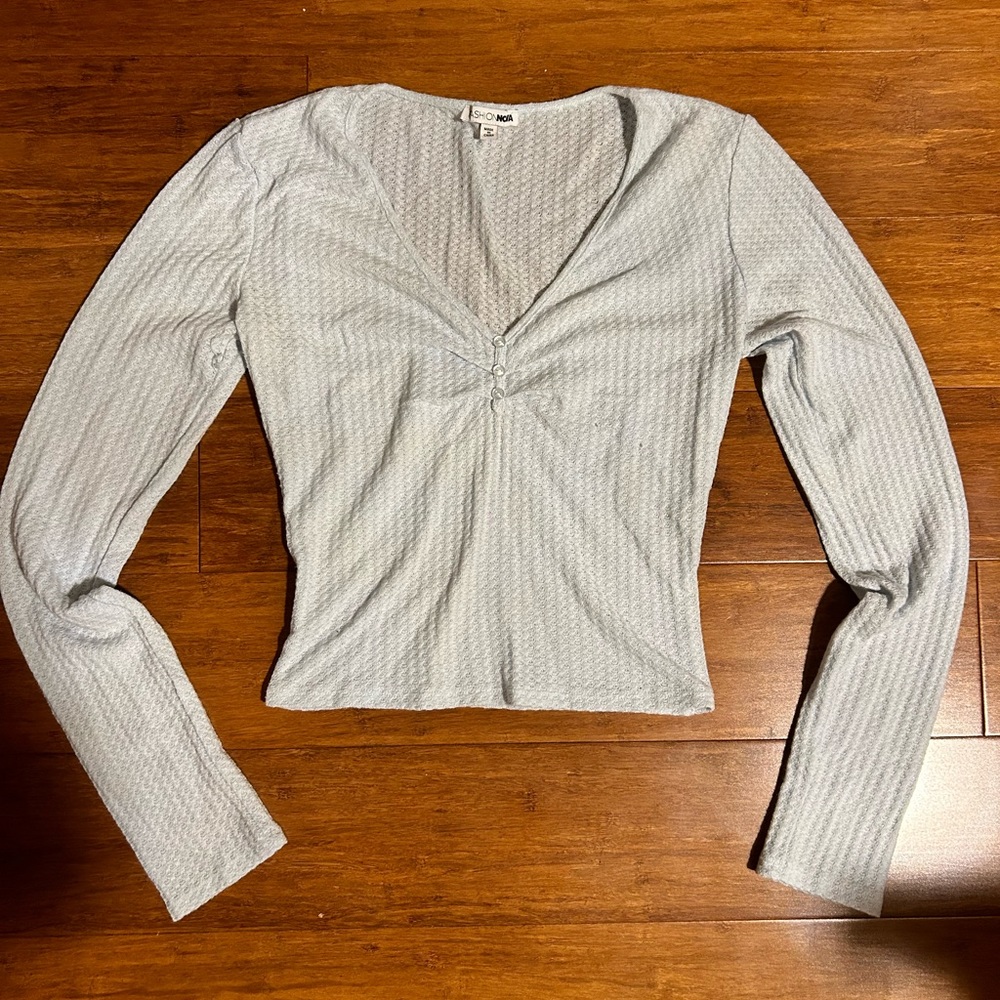 Light blue V neck button top